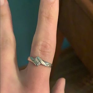 10k white gold ring with three diamonds